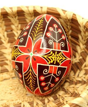 Handcrafted Pysanky Egg - Red Sun & Flower Design